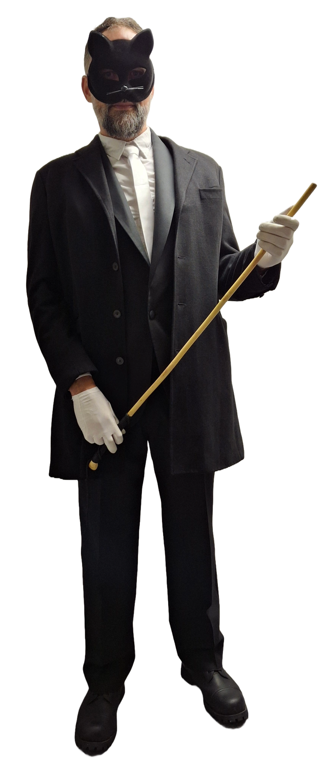 Apanther, founder of Ethical Impact Corporation, in a cat mask and holding a cane